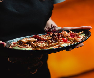 chicken fajitas in a traditional boat